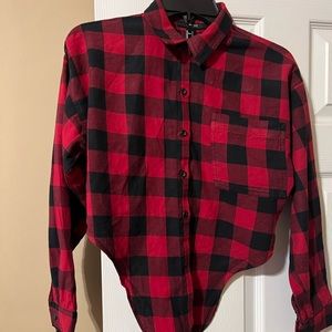 Black and red checked button down shirt.